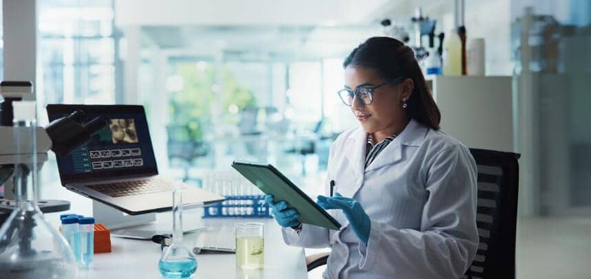A scientist reviewing analytical method validation data in a pharmaceutical lab
