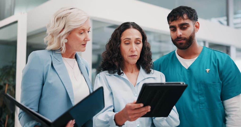 Clinical trial team reviewing protocol requirements during site preparation