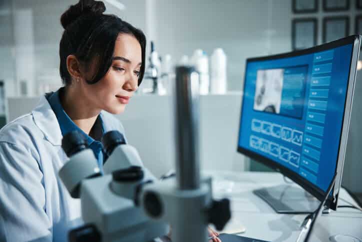 A clinical research professional reviewing data for risk-based monitoring
