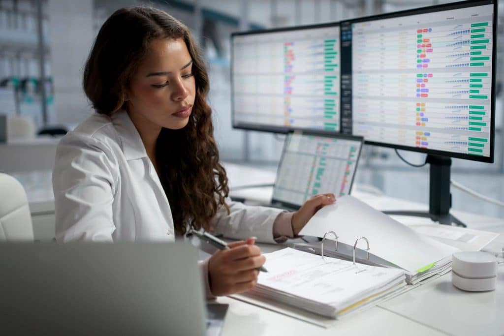 A research professional checking protocol documentation