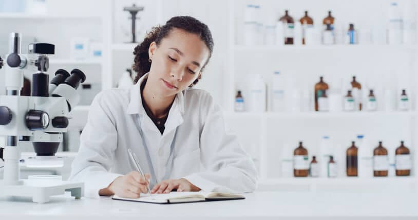 A clinical research student reviewing a clinical trial protocol before a monitoring or coordination role