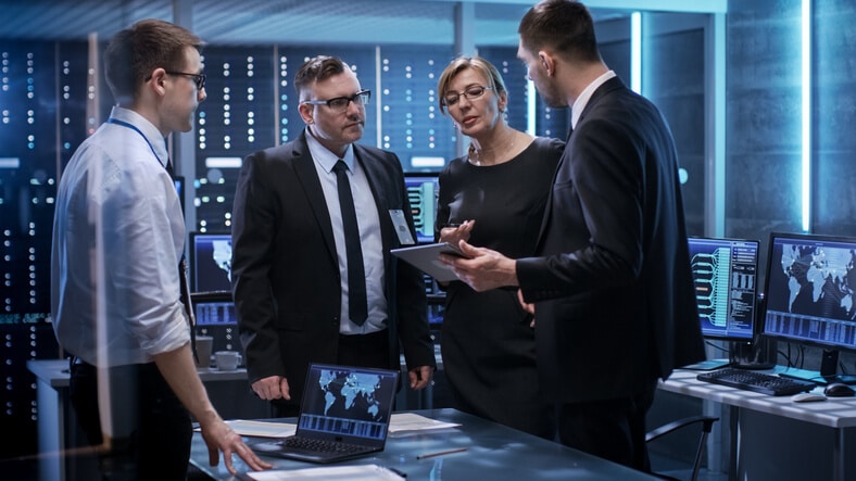 A security operations team discussing business continuity strategies