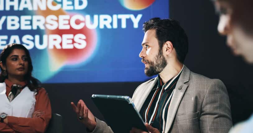 A cybersecurity analyst reviewing an incident response playbook during a security event