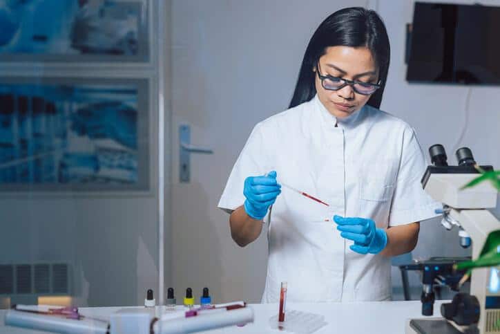 An analytical method validation testing performed by a pharmaceutical laboratory analyst