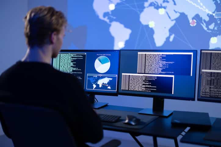 A cybersecurity student analyzing network traffic using Wireshark