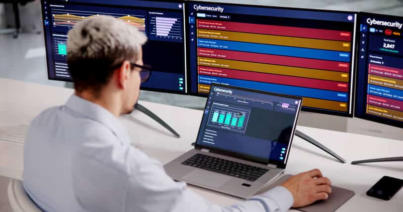An entry-level cybersecurity analyst reviewing IDS and IPS alerts