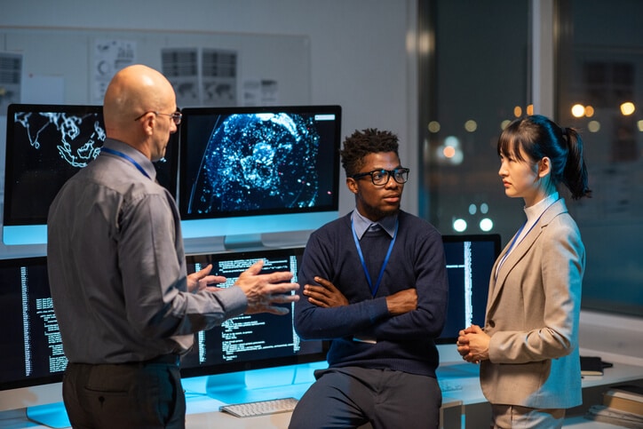 A cybersecurity team applying privacy by design in Canada during system development