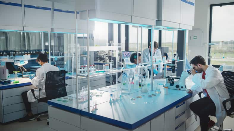 Quality assurance professionals working in a lab