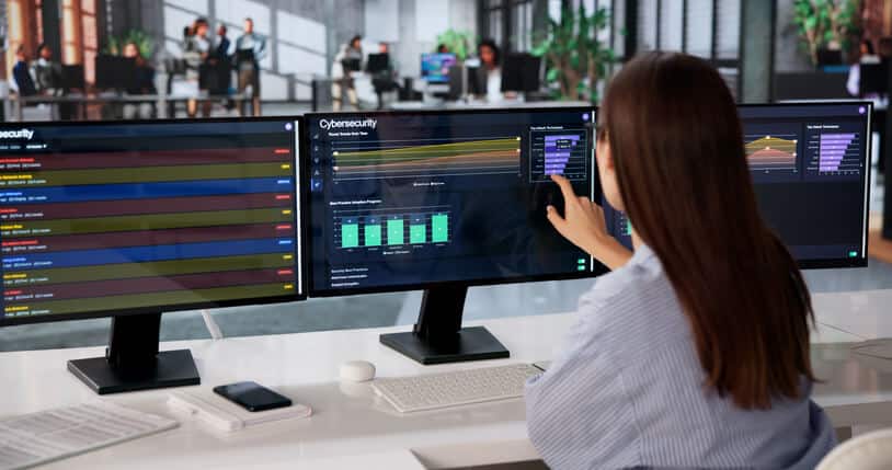 A cybersecurity student analyzing organizational risk data using a risk assessment framework during training